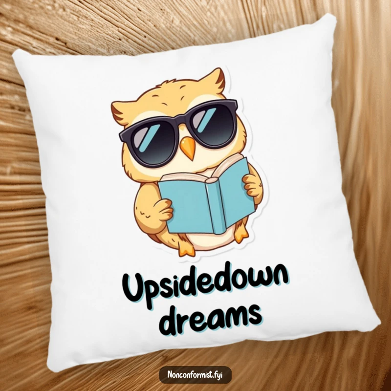 Funny pillow featuring a cool owl in sunglasses reading a book upside down, offering plush, humorous wisdom.