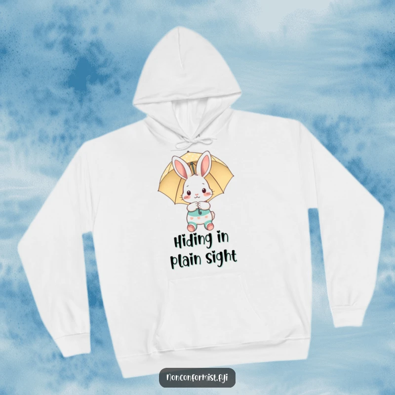 Funny hoodie featuring a shy bunny in mismatched socks peeking from behind an umbrella, a warm funny gift.