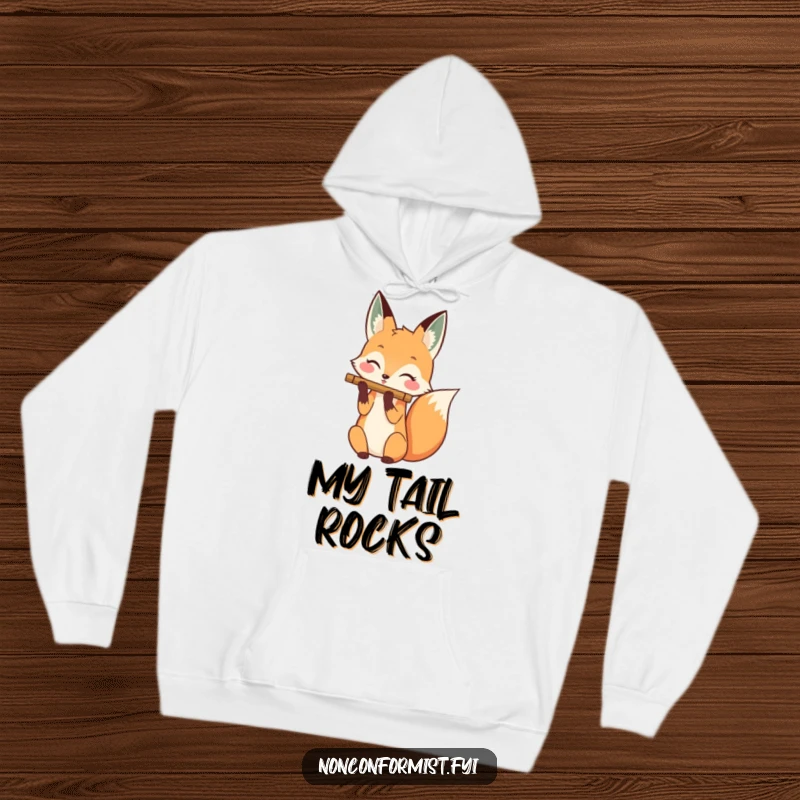 Funny hoodie depicting a happy fox character skillfully playing a flute with its tail, surrounded by musical notes.