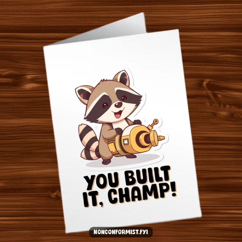 Funny Free Printable Congratulations Card: Jubilant raccoon celebrating the completion of a strange, inventive contraption with sparkling eyes.