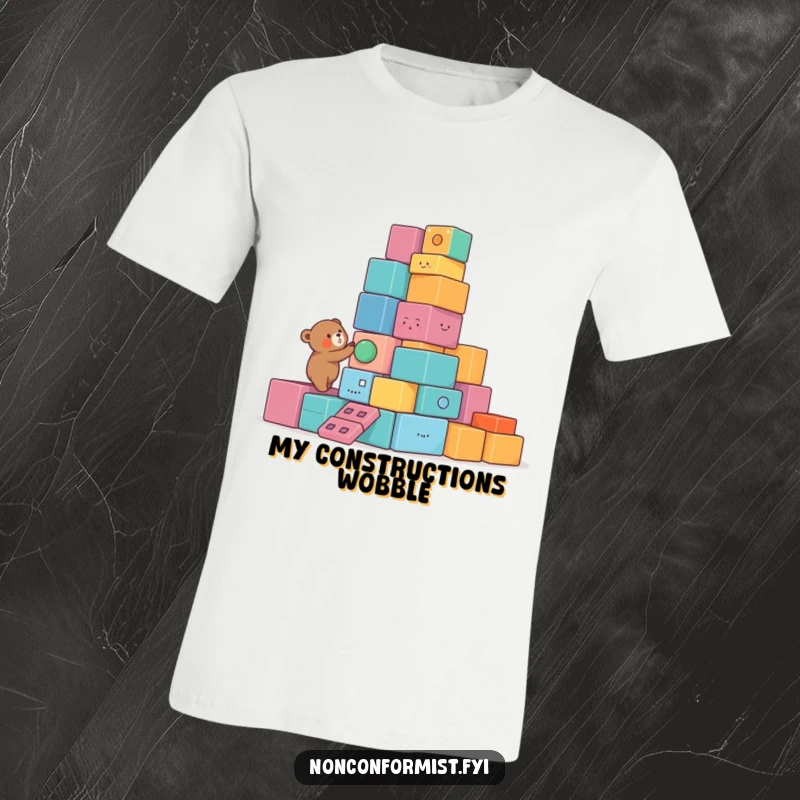 Funny Bear T-Shirt showcasing a small bear character building a lopsided tower of colorful, unusual blocks, a humorous and creative design.