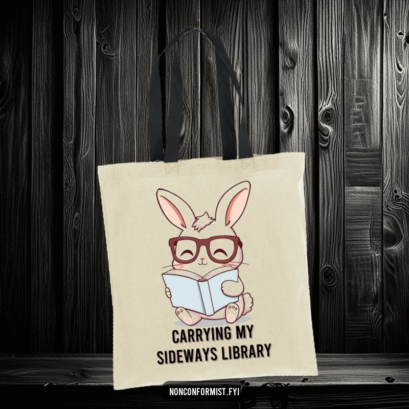 Funny bunny tote bag showcasing a curious rabbit with glasses, reading a sideways book, ideal for humorous book transport.