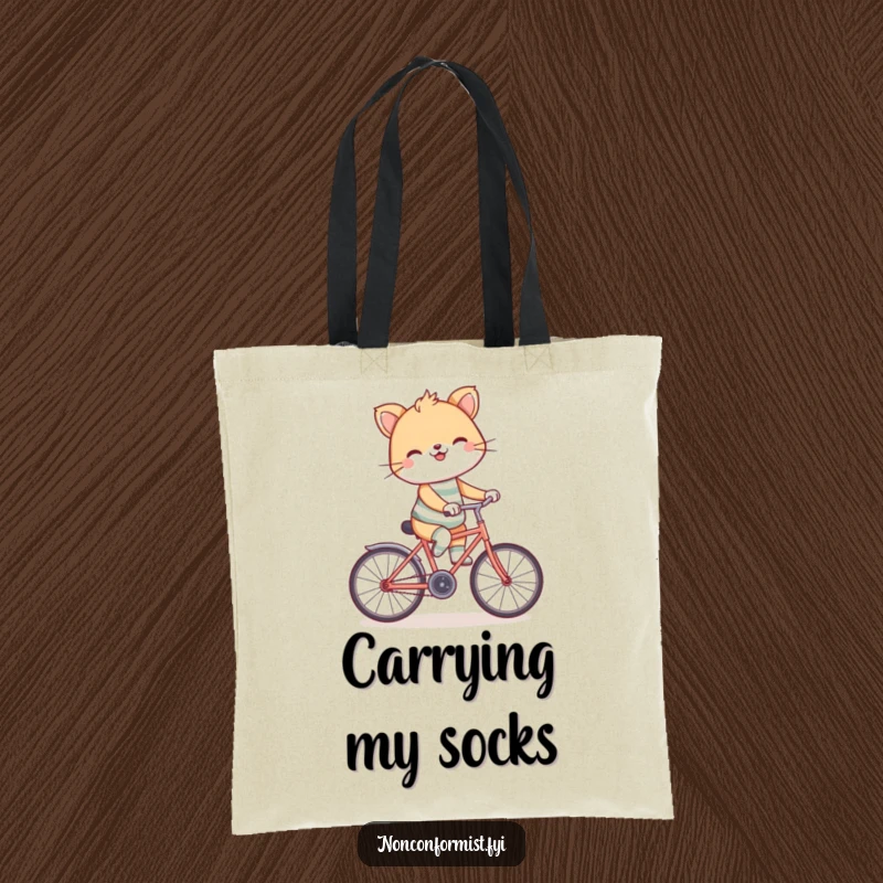 Funny backward bicycle tote bag with a grinning animal in mismatched socks, riding a bike backwards, perfect for quirky essentials.